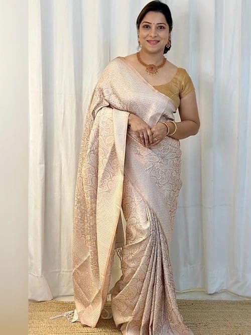 Peach Banarasi Woven Embellished Saree with Zari Border
