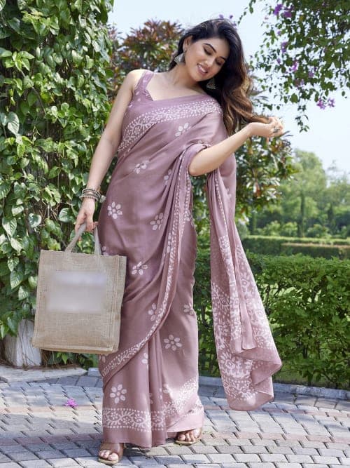 Pink and white Batik printed saree with solid border