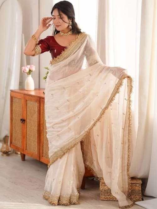 Off White Shimmer Satin Saree with Embroidered Border & Embellishments